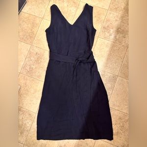 Navy mid length wrap dress. Perfect for weddings!